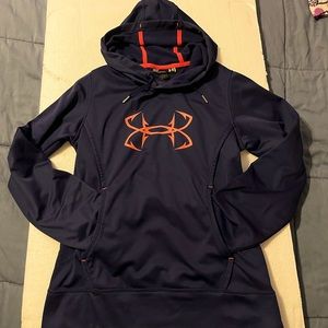 Under Armour hoodie. Black with pink logo and piping - size small.